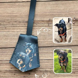Custom hand-painted pet portrait leather luggage tag and bag charm with cute dog design.