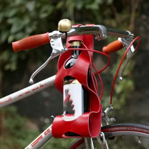 Red PU leather bicycle wine bottle holder for handlebars, outdoor cycling gear storage.