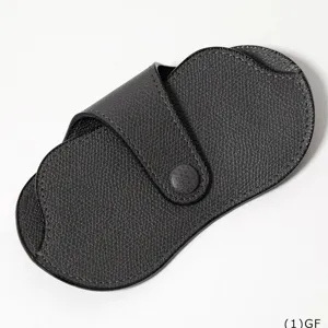 Dark grey PU leather foldable glasses case detail shot, sleek minimalist portable storage.