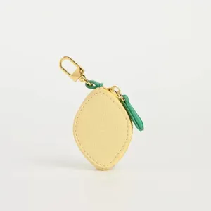 Lemon shaped coin purse cute fruit PU leather keychain zipper wallet mini bag charm close-up detail