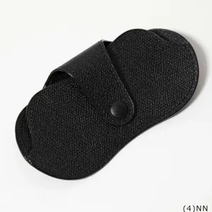Detailed view of the black PU leather glasses case with secure snap button closure design.