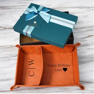 PU leather valet tray organizer with partition and gift box for desktop storage and home decor.