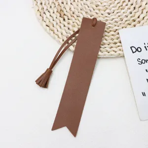 Brown PU leather tassel bookmark for student notebooks, elegant page marker and reading accessory.