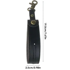 Schwarzer Kendama Schutzetui Lederriemen mit langlebigem Metallverschluss und Druckknopf.
