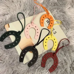 Fashion PU leather horseshoe bag charm colorful U-shaped pendant handbag accessory for women