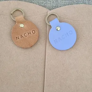 Etiqueta de identificación de cuero redondo personalizado para mascotas perro diseño