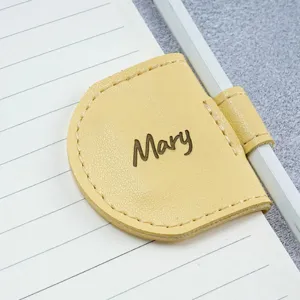 PU leather magnetic bookmark pen holder, yellow soft leather pencil clip detail shot.