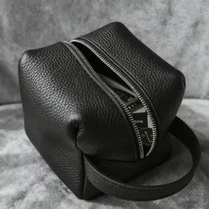 Bolsa de cosmeticos de cuero negro bolso de viaje de maquillaje con cremallera.