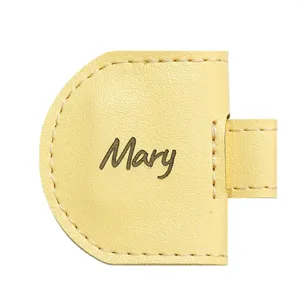 Close-up detail of the yellow PU leather magnetic bookmark and pencil holder with custom text.