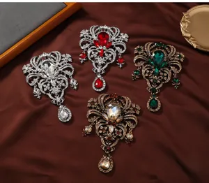 Vintage rhinestone hollow flower brooch collection, exaggerated glass pendant coat accessories.