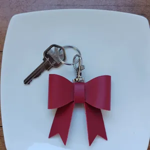 Red PU leather bow keychain bag charm cute sweet bowknot pendant accessory keyring.