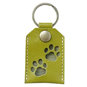 Green PU leather keychain detail, cute hollow paw print design, secure metal ring clasp.