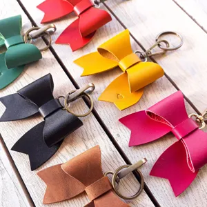 Cute PU leather bow keychain bag charm, sweet bowknot keyring pendant accessories for daily use.