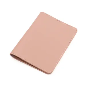 PU leather passport holder detail shot, compact travel card organizer with neat stitching.