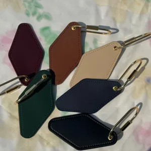 PU leather keychain with brass hardware, double-sided diamond motel key tag set for car keys.