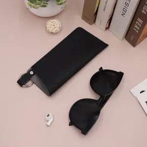 Portable PU leather glasses pouch with spring ring, anti-scratch sunglasses storage bag.