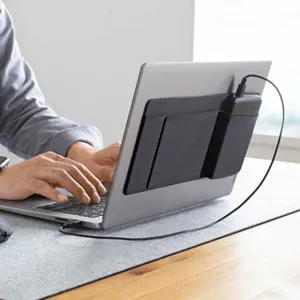 Portable laptop adhesive storage pouch for mouse and cables, stick-on back pocket organizer.
