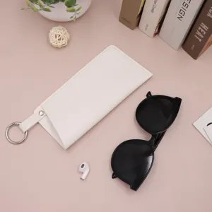White PU leather glasses case detail view, portable pouch with metal spring ring.