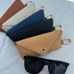 Portable woven glasses case with metal hook, multi-color travel sunglasses storage bag.