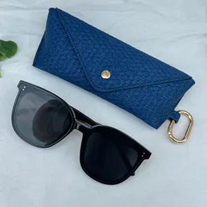 Portable woven glasses case with black sunglasses set, travel fashion sun glasses storage bag.
