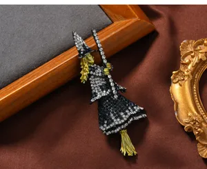 Vintage black rhinestone witch on broom brooch, exquisite Halloween fashion clothing jewelry gift.