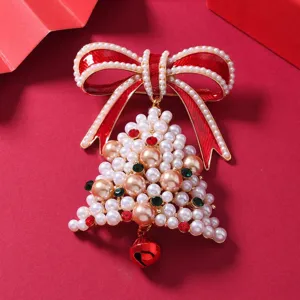 Christmas pearl bow brooch with bell, festive rhinestone alloy pin for holiday gifts.