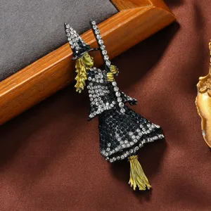 Vintage black crystal witch on broom brooch, perfect Halloween festive party gift and cute pin.
