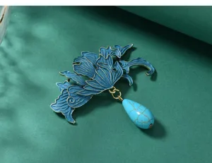 Exquisite Chinese style enamel flower brooch detail, elegant turquoise teardrop pin.