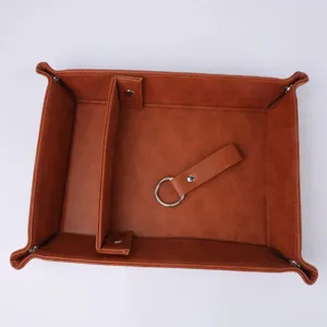 Brown PU leather desktop storage tray with divider and keychain, perfect for desk and entry.