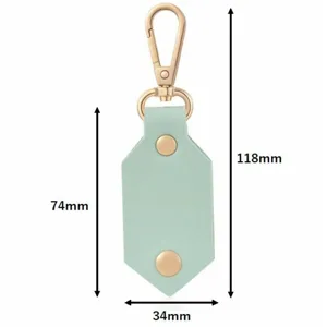 Mint green PU leather mini photo frame keychain with gold hardware, perfect bag charm gift.