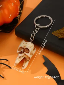 Halloween skull tooth keychain, gothic metal ring pendant, spooky party bag charm accessory.