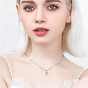 Minimalist silver heart pendant necklace for women, elegant daily wear jewelry gift.