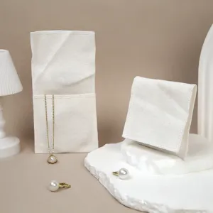 Sacchetto porta gioielli in tela di cotone, vista dettagliata borsa morbida elegante.