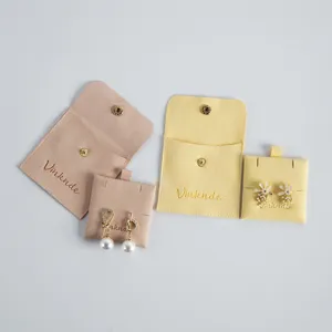Soft flannel jewelry storage pouch with snap button, perfect for rings, earrings and small accessories.