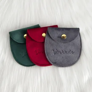 Pochette en velours avec bouton-pression pour bijoux, sac de rangement semi-circulaire.