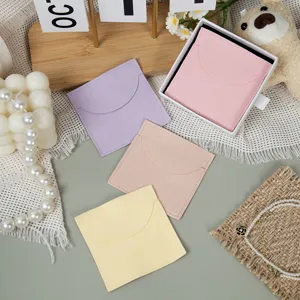 Detailed view of pastel flannelette jewelry pouch envelope bags for small gifts and watches.