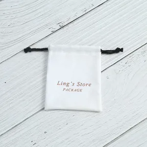 Weißer Baumwollbeutel mit Kordelzug für Schmuck Aufbewahrung und kleine Geschenkverpackung