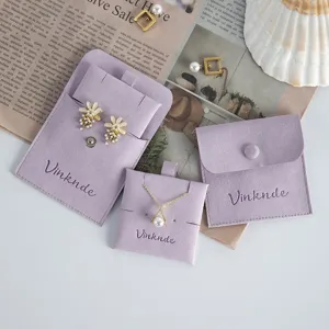Purple velvet jewelry storage pouch with snap button, flip cover flannel bag for rings and earrings.