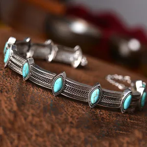 Vintage bohemian turquoise metal cuff bracelet for women, stylish holiday jewelry accessory.