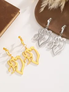 Stylish irregular metal clip earrings in gold and silver, elegant geometric jewelry design.