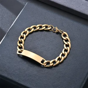 Close up detail of a stylish gold stainless steel Cuban link ID bracelet for men and women.