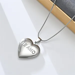 Stainless steel heart locket pendant detail, openable photo box necklace closeup view.