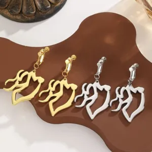 Detailed close-up of irregular asymmetrical tassel clip-on earrings in gold and silver.