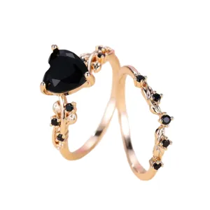 Elegante set di anelli con cuore nero in zircone, anelli impilabili foglia oro.