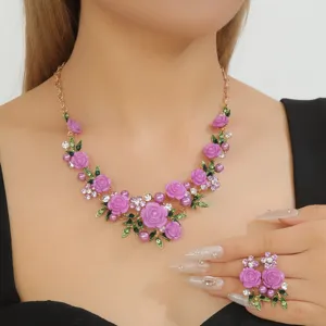 Chic purple enamel camellia necklace earrings set, elegant pearl rhinestone floral jewelry.