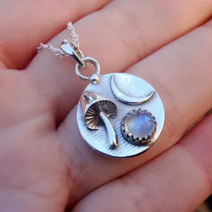 Silver mushroom moon moonstone pendant necklace showcasing detailed celestial and nature design.