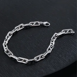 Bracciale a catena argento uomo gioiello minimalista in acciaio al titanio elegante.