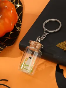 Halloween ghost bottle keychain detail view, cute mini glass jar pendant for spooky decor.