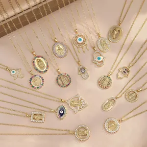 Assortment of gold-plated copper pendant necklaces featuring Virgin Mary and evil eye charms.