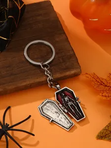Halloween metal keychain featuring an openable coffin pendant with skeleton detail for spooky style.